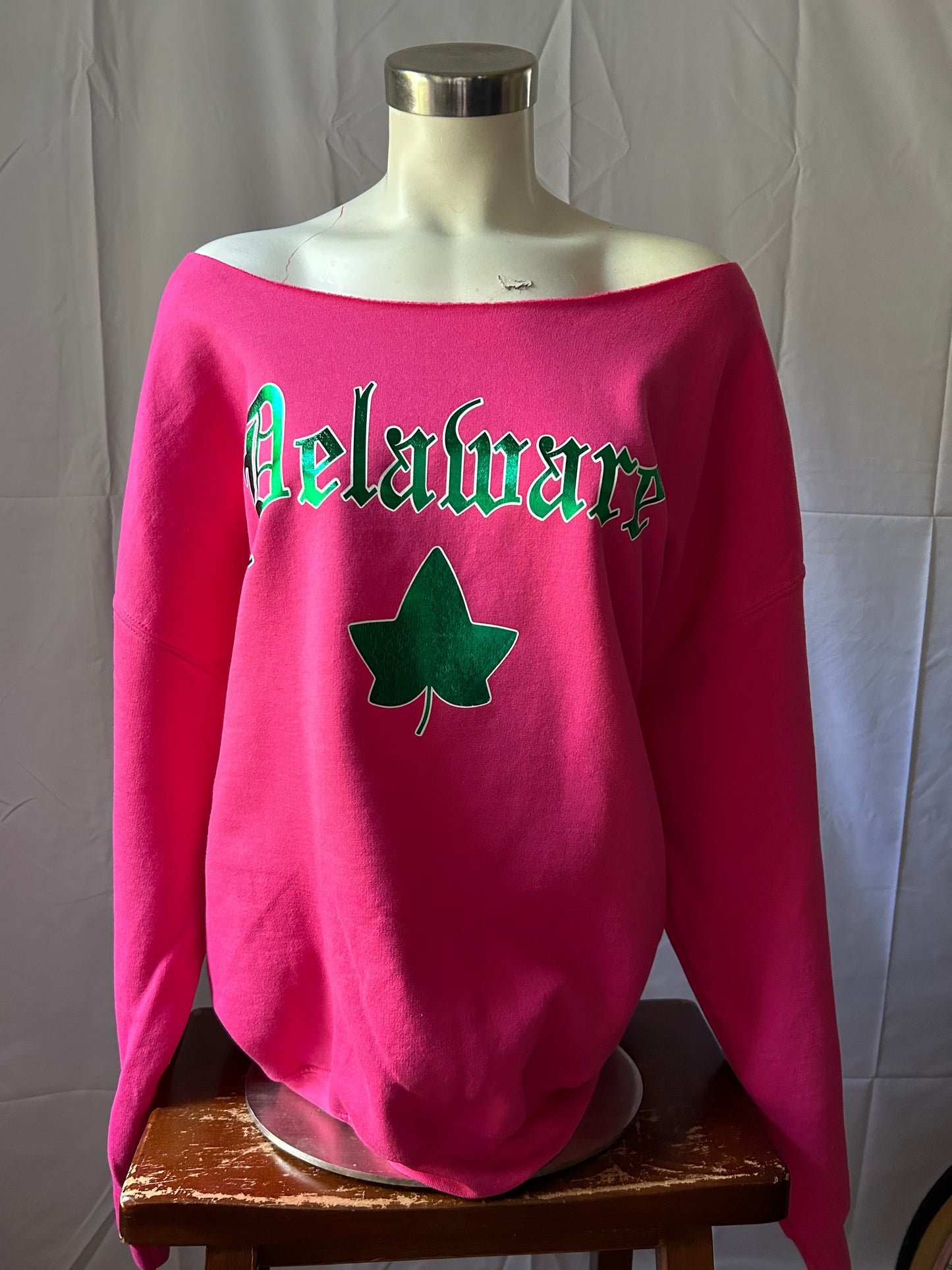 Jennaydra’s 2024 University of Delaware Ivy Pink & Green Foil Customizable Sweatshirt by Cami Co. Lace ($60-$87.50)