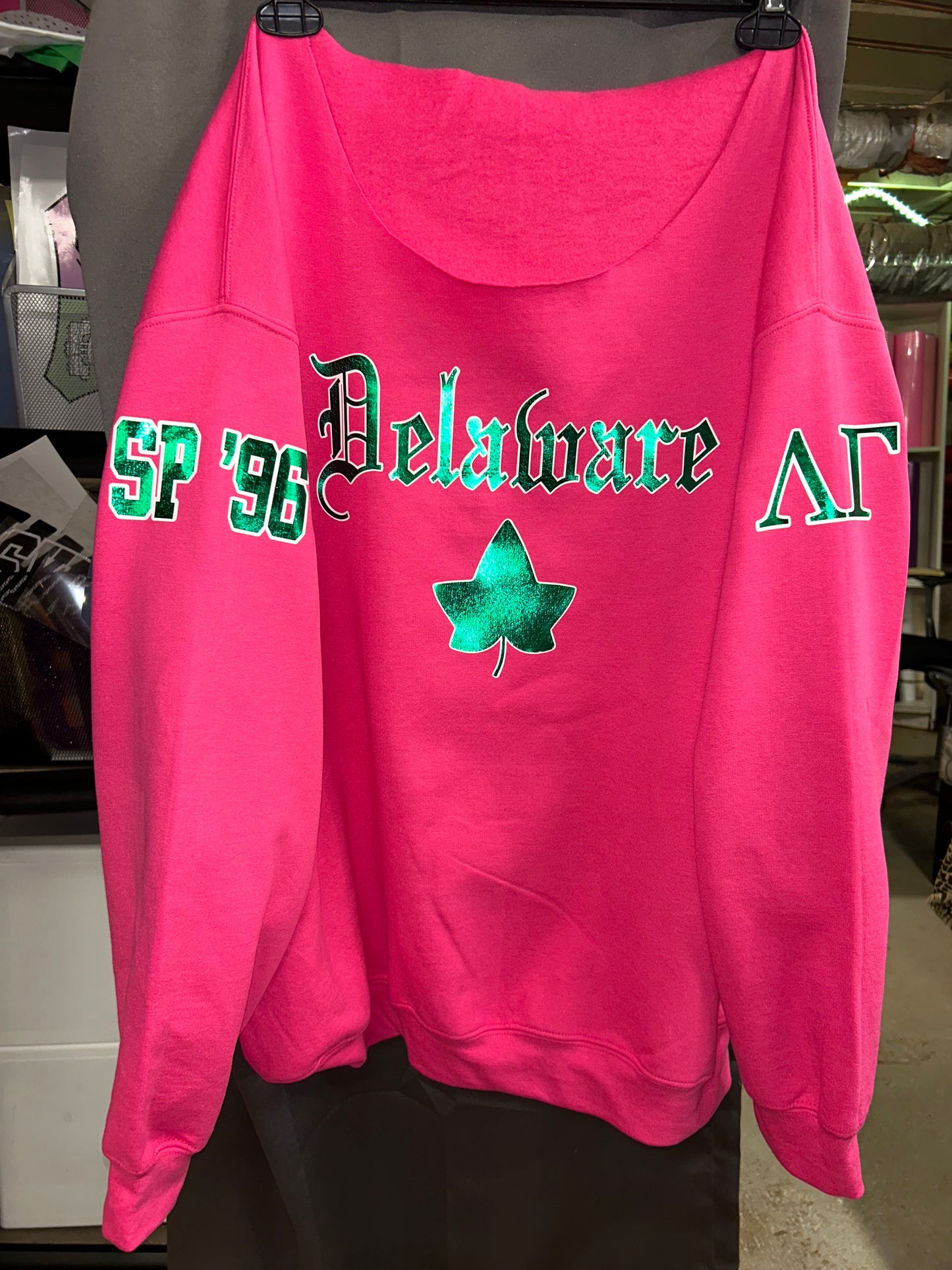 Jennaydra’s 2024 University of Delaware Ivy Pink & Green Foil Customizable Sweatshirt by Cami Co. Lace ($60-$87.50)